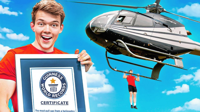 飛行中のヘリコプターに「ぶら下がり懸垂」でギネス世界記録　超高難度の技を実現した海外YouTuberの挑戦に迫る