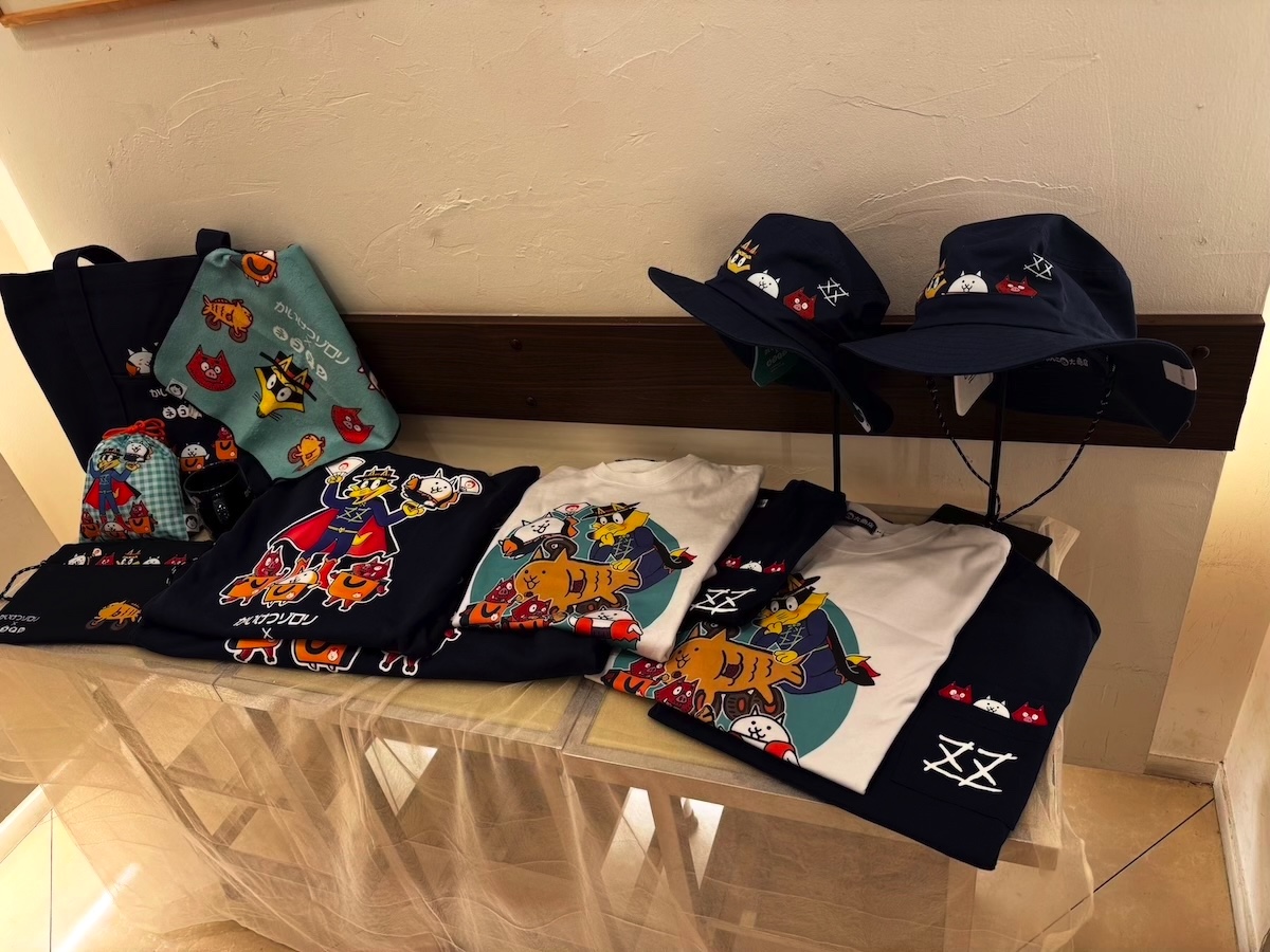 「パズルで豊作！にゃんこ村 出張直売所 in 西武渋谷店」と「にゃんこ大商店 ～出張所～」の様子